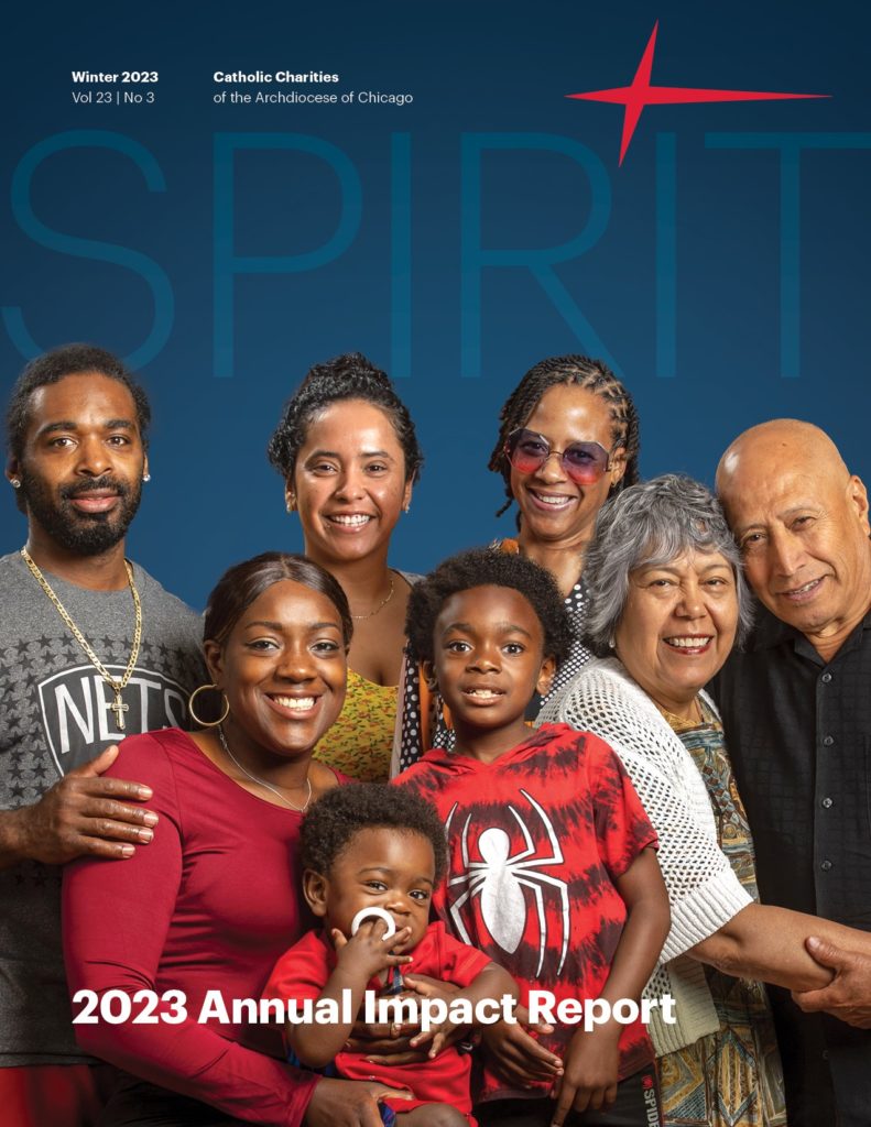 Spirit Magazine 2023 Annual Impact Report cover. Featuring smiling people posing for group photo