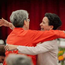 Two women hugging